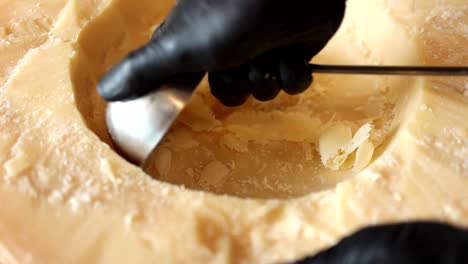 preparing parmesan cheese