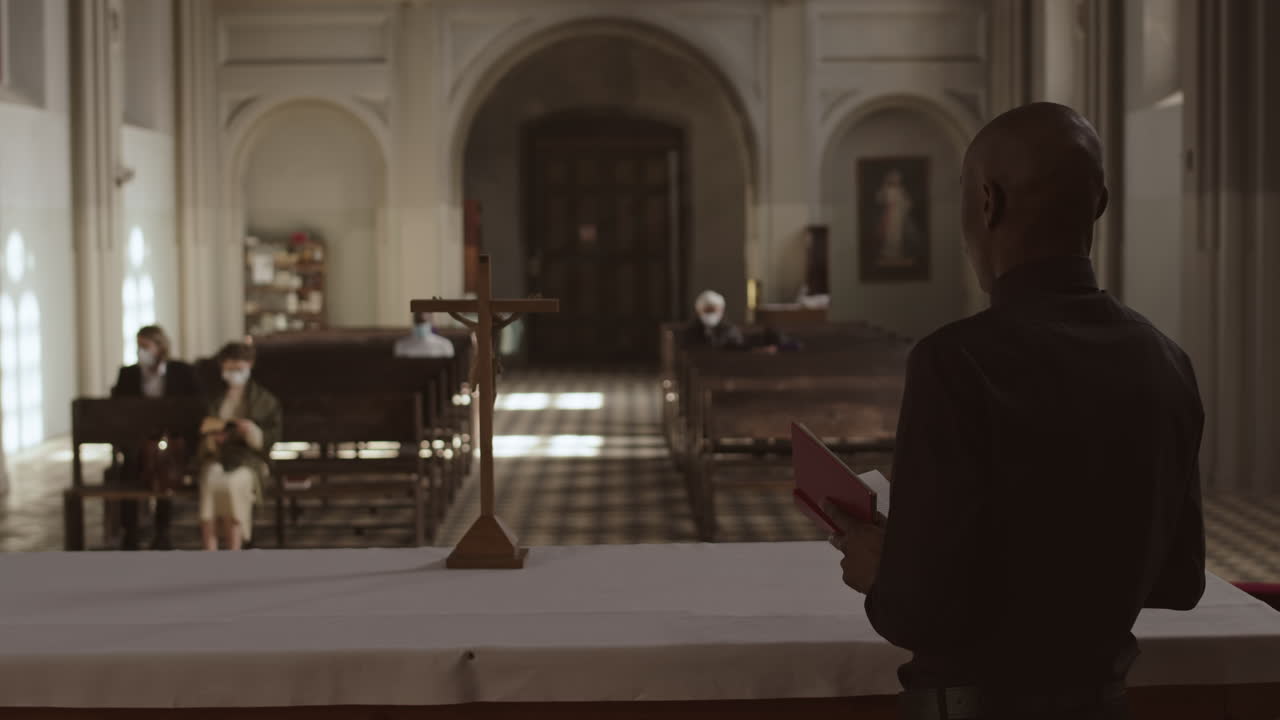 African-American Pastor Preaching Sermon in Christian Church