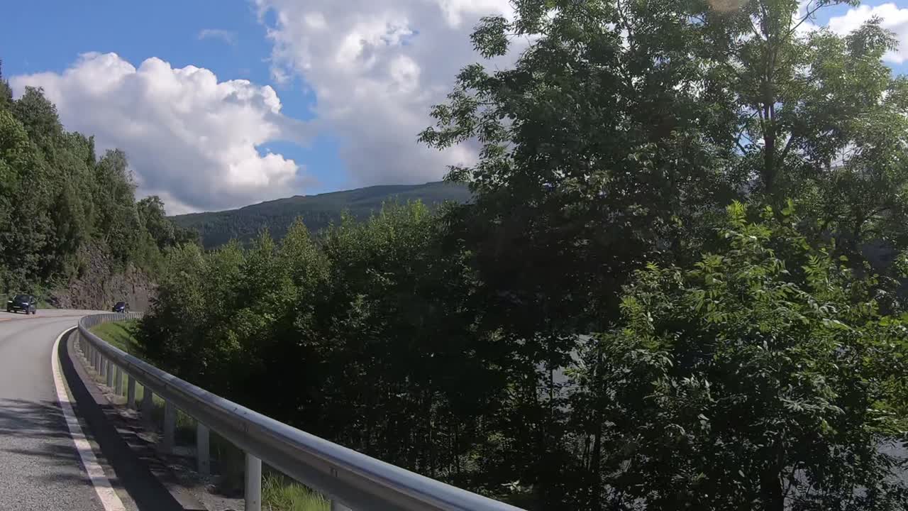 Driving in Vossevangen, car passenger point of view, nature landscape, Norway