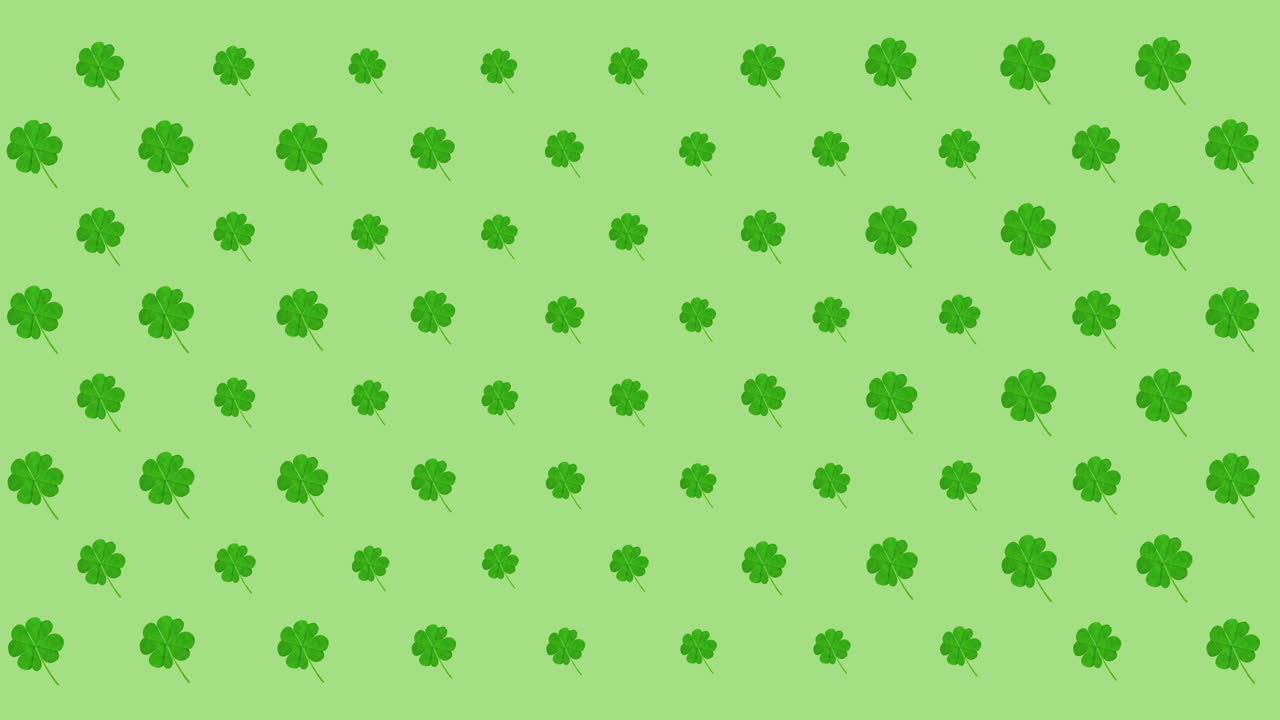 Animazione di file di foglie di trifoglio pulsanti su sfondo verde.
