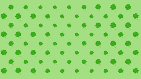 animation of rows of pulsating clover leaves on green background