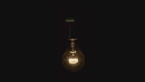 single illuminated light bulb