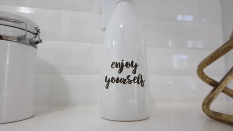 close up of enjoy yourself mug