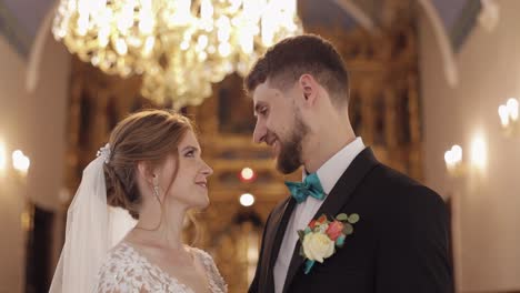 Newlyweds.-Caucasian-bride-and-groom-together-in-an-old-church.-Wedding