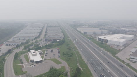 highway and industrial area in mississauga, affected by wildfire smoke, aerial view