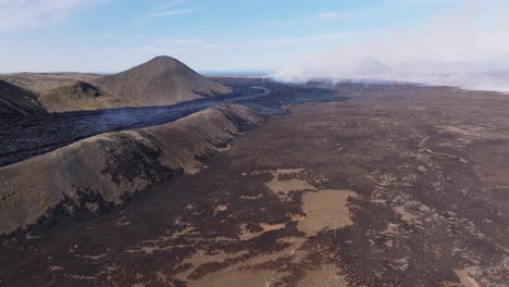 New-land-forming-in-Iceland-from-distant-volcano-eruption,-black-basalt-rock