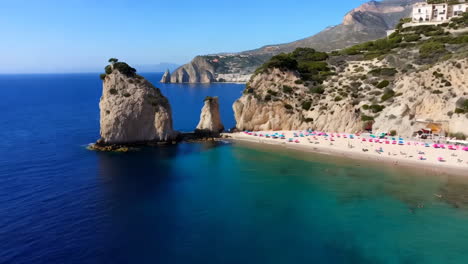 beautiful beach with cliffs and mountains