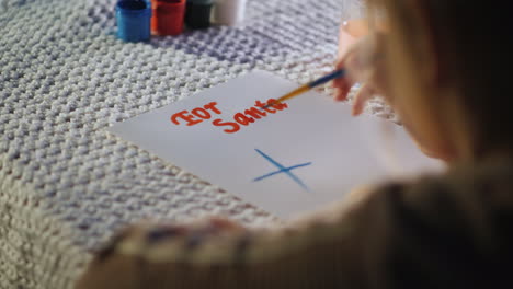 child writes a letter to santa claus