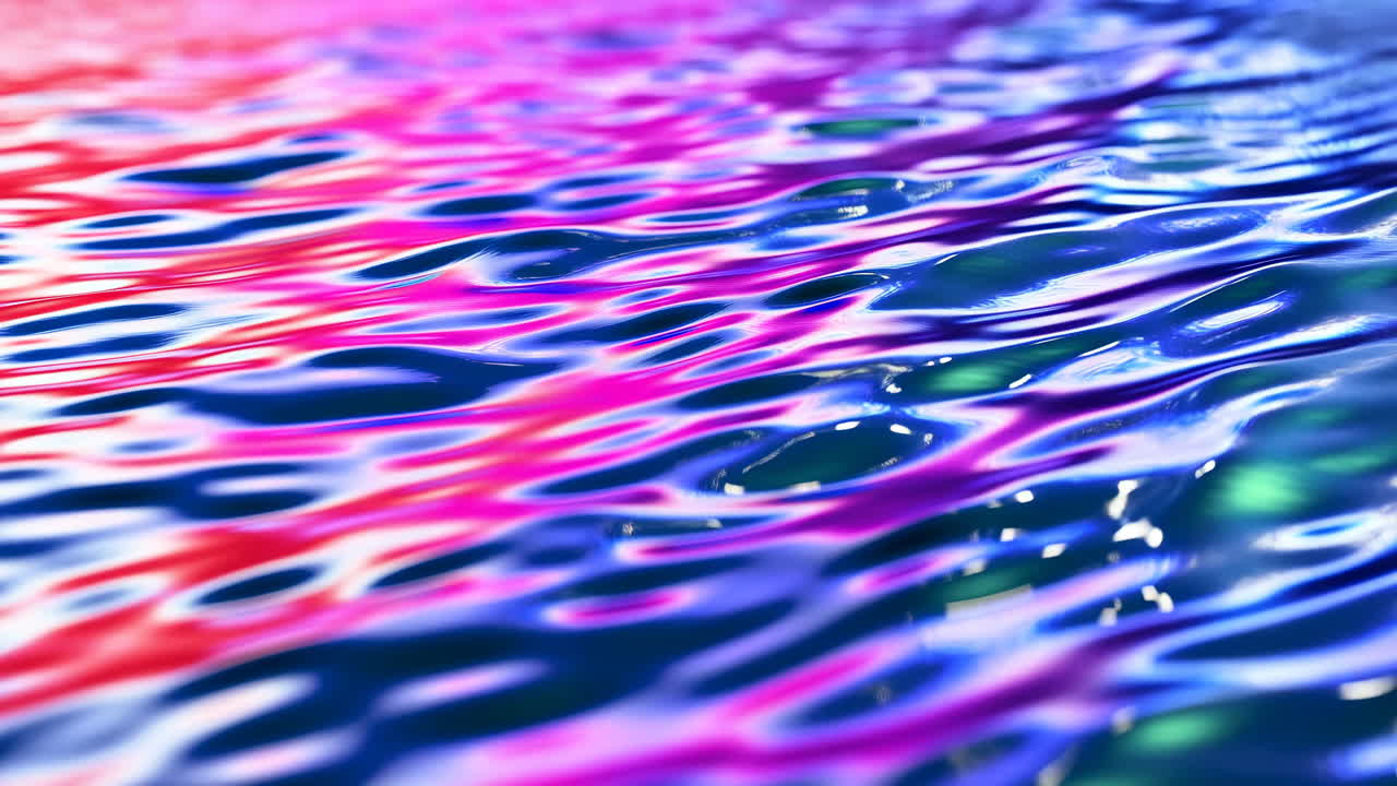 Primer plano de ondulaciones de agua que reflejan colores abstractos vibrantes