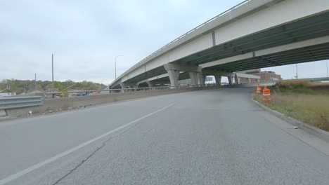 pov driving on exchange ramps on interstate i74 near the mississippi river in moline illinois