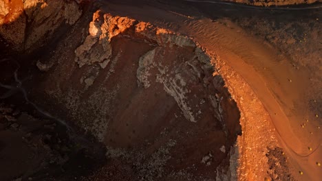 a breathtaking aerial drone view of volcano del cuervo at sunset in lanzarote, canary islands, spain.