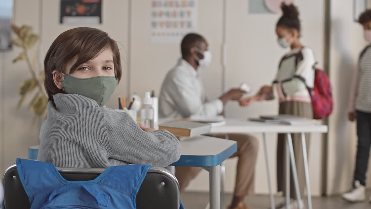 School Boy in Classroom during Covid19