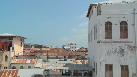 time lapse shot looking over the rooftops of stone town zanzibar