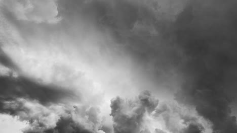 thick cumulonimbus clouds and lightning strike