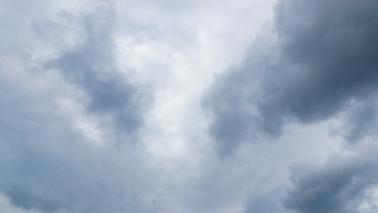 Timelapse of fast moving clouds on blue sky to dark shadow clouds captured during sunny day to late time captured in Czech Republic Europe super high resolution