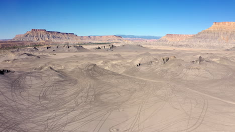 Factory-Butte-Hill-In-Utah-During-A-Sunny-Day-With-Blue-Sky---aerial-drone-shot