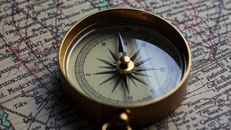 vintage compass on antique map