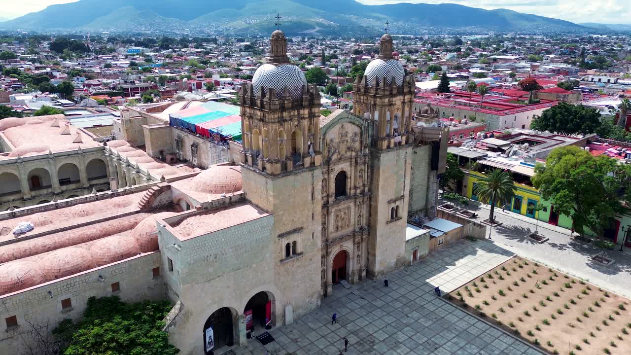 Drone aerial landscape of old town square cathedral church museum of culture and history with parks and streets in Oaxaca city Mexico infrastructure urban travel tourism