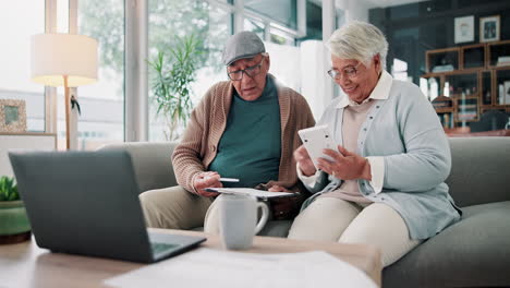 senior couple planning finances at home