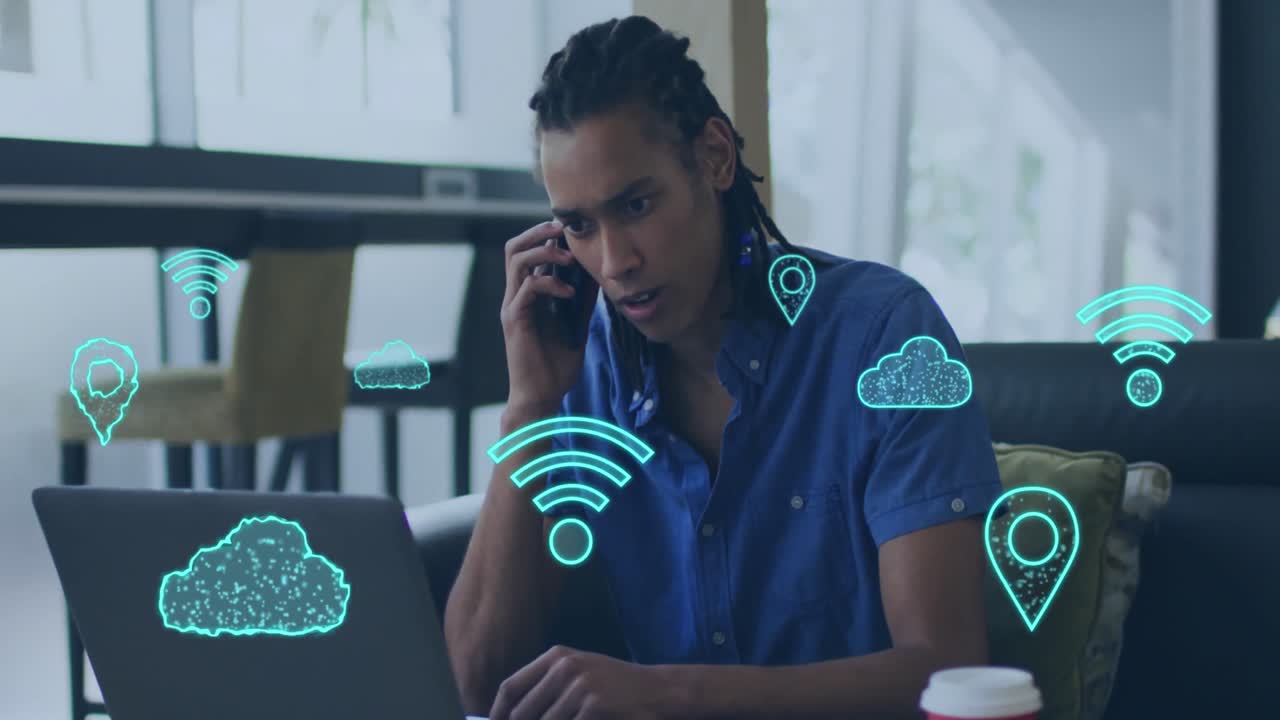 Animation of media icons over biracial man using smartphone