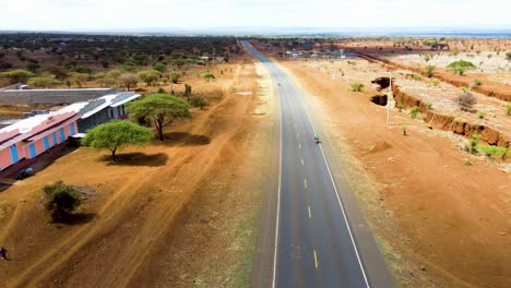 Birdseye-aerial-view-of-rural-roads-in-Kenya,-shanty-poor-neighborhood-of-Loitokitok,-Kenya