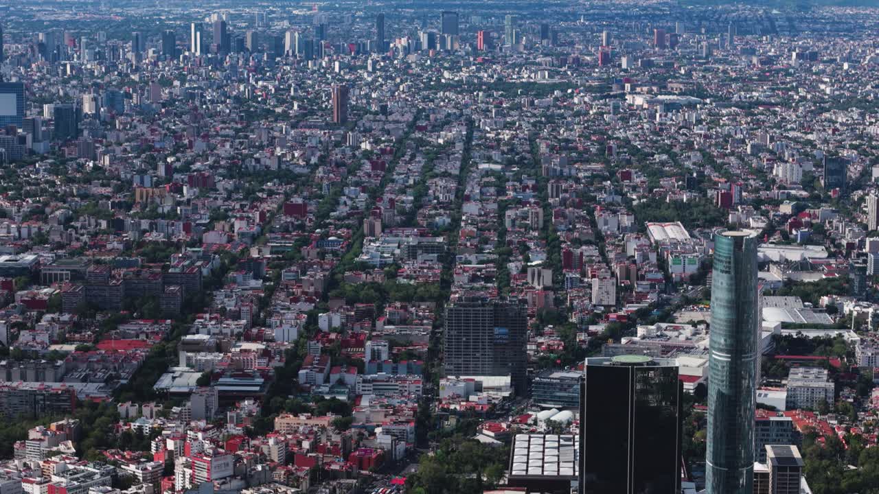 Drone view of Mexico City on a clear day, looking from south