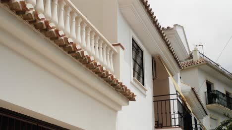 tilted slow motion dolly of typical white mediterranean houses in spain