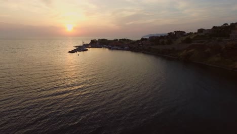 aerial: the town of molyvos on lesbos island during sunset