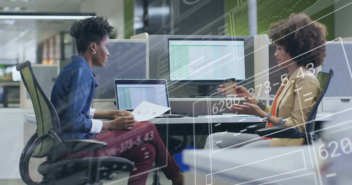 Two women holding report and tapping phone reviewing business sheet with animated overlays sweeping
