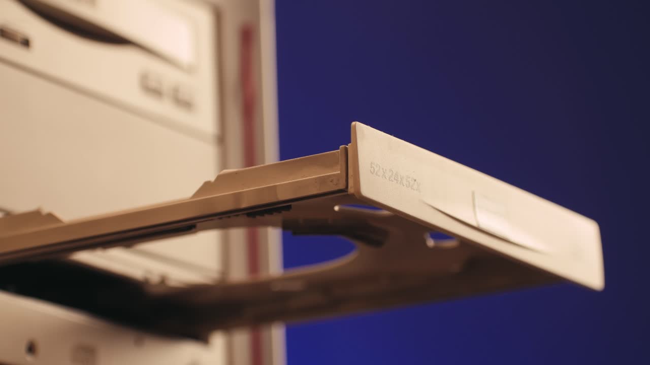 Using CD circle disk for old computer. Dvd player, disc drive. Music recorder, playing retro computer games. . High quality 4k footage