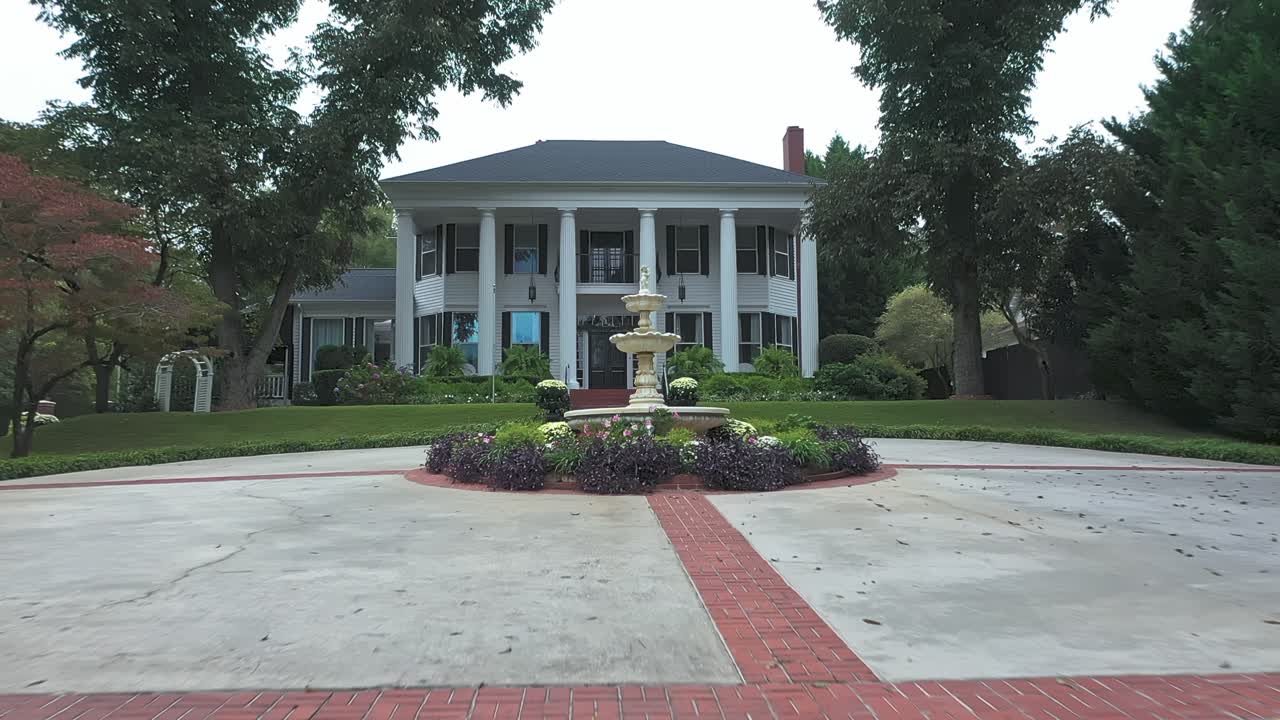 Exterior Of Event Venue And Garden With Water Fountain At Hogansville, Georgia. - aerial shot