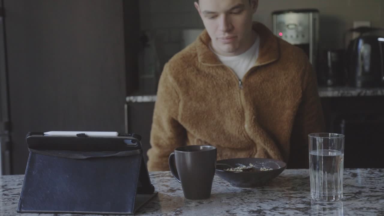 Man Eating Breakfast Alone - close up