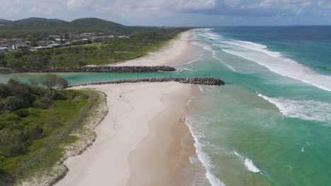 aerial view of beach and ocean waves