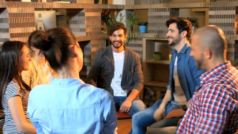 group of business executive giving high five to each other