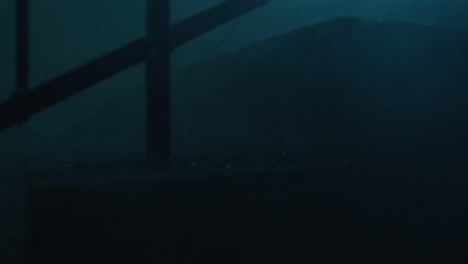 dark, foggy basement stairs at night