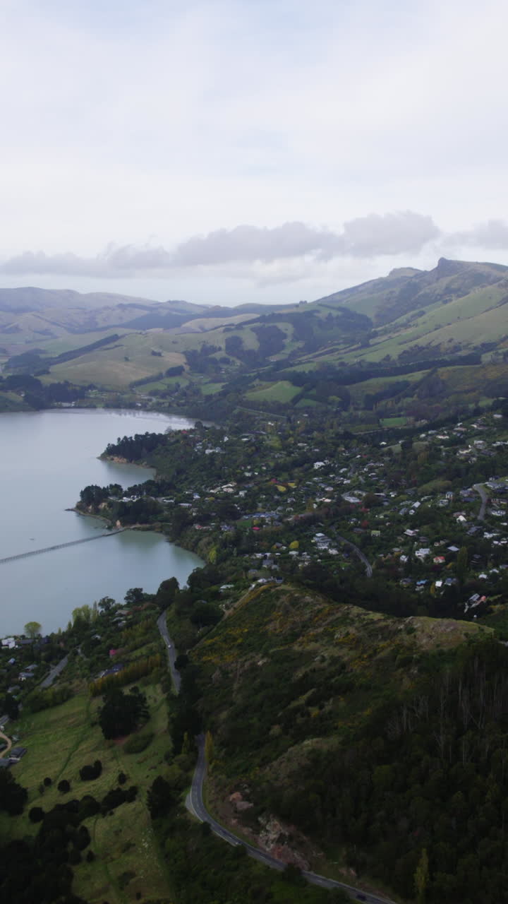 Vertical drone shot approaching the Governors bay in Canterbury, New Zealand