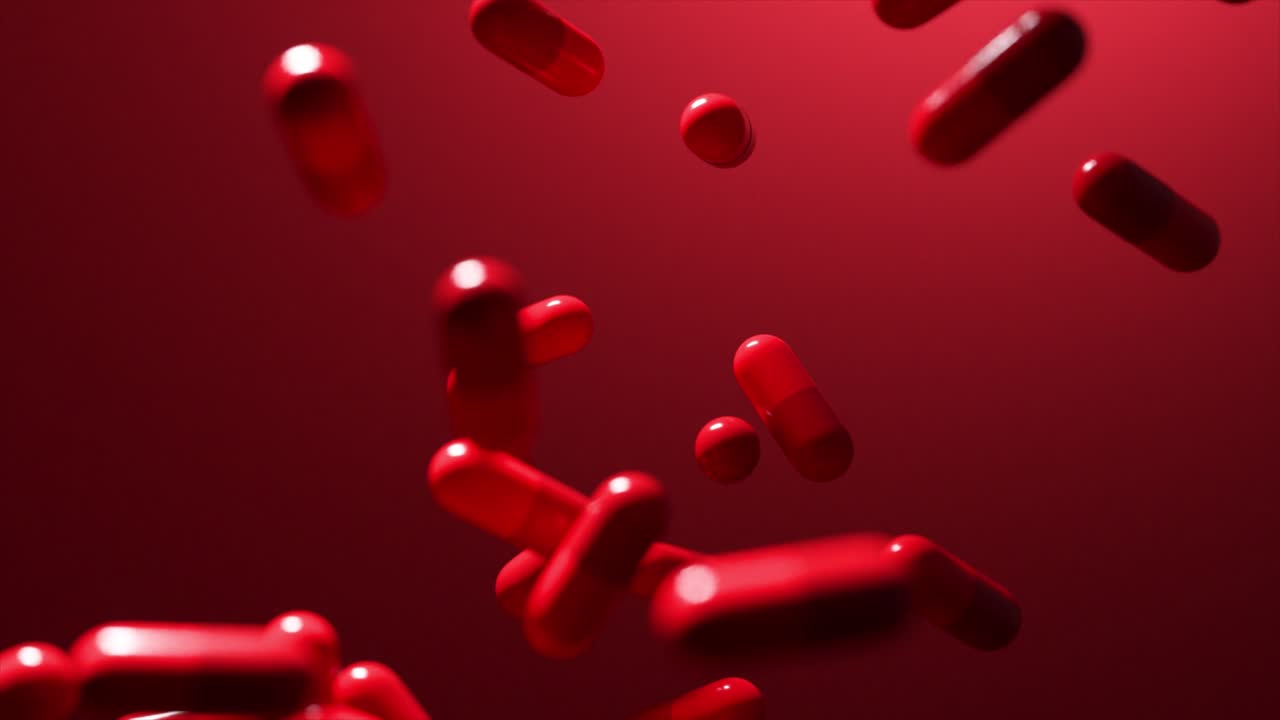 quedas de cápsulas vermelhas