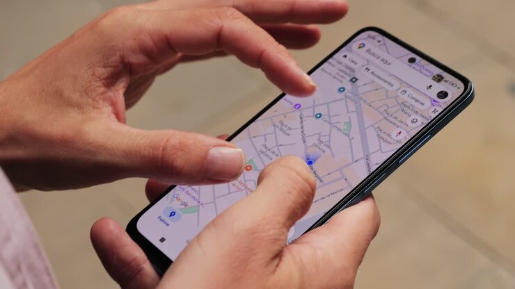 Man tourist using smart phone searching location in map application online close up macro. Backpacker using GPS to find destination on vacation. City or Forest hiking, walking in europe