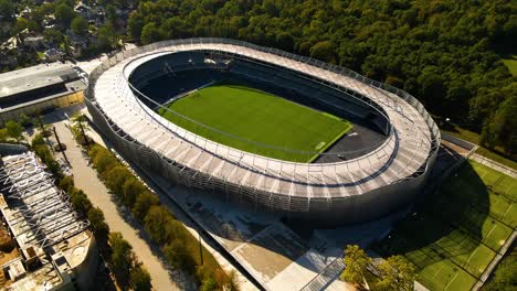 aerial-shot-of-a-newly-opened-Darius-and-Girenas-Stadium-on-a-sunny-summer-day-in-Kaunas,-Lithuania