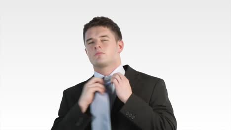 Businessman-fixing-his-tie