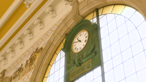 Old-clock-at-train-station-in-Porto,-Portugal