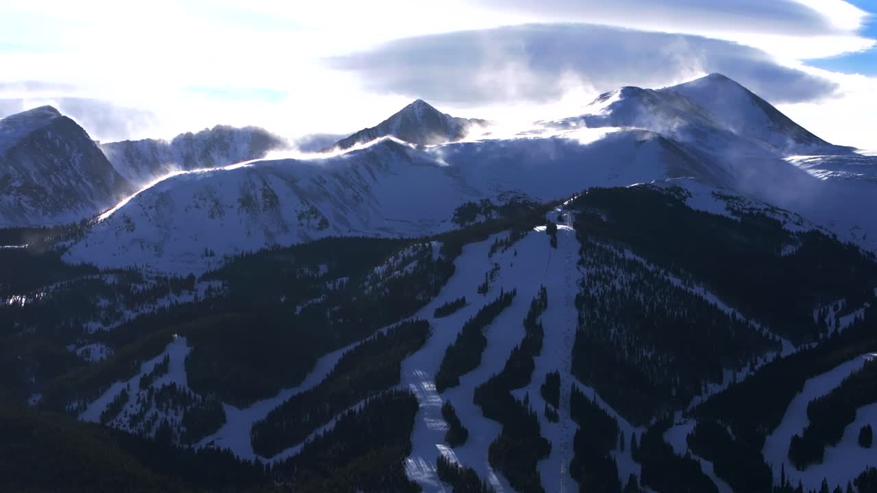Imperial Express Superchair at Breckenridge Ski Resort Colorado aerial drone sunset golden hour late afternoon high winds Quandary Peak 6 7 14er ski snowboard trail Epic Pass Vail runs circle right