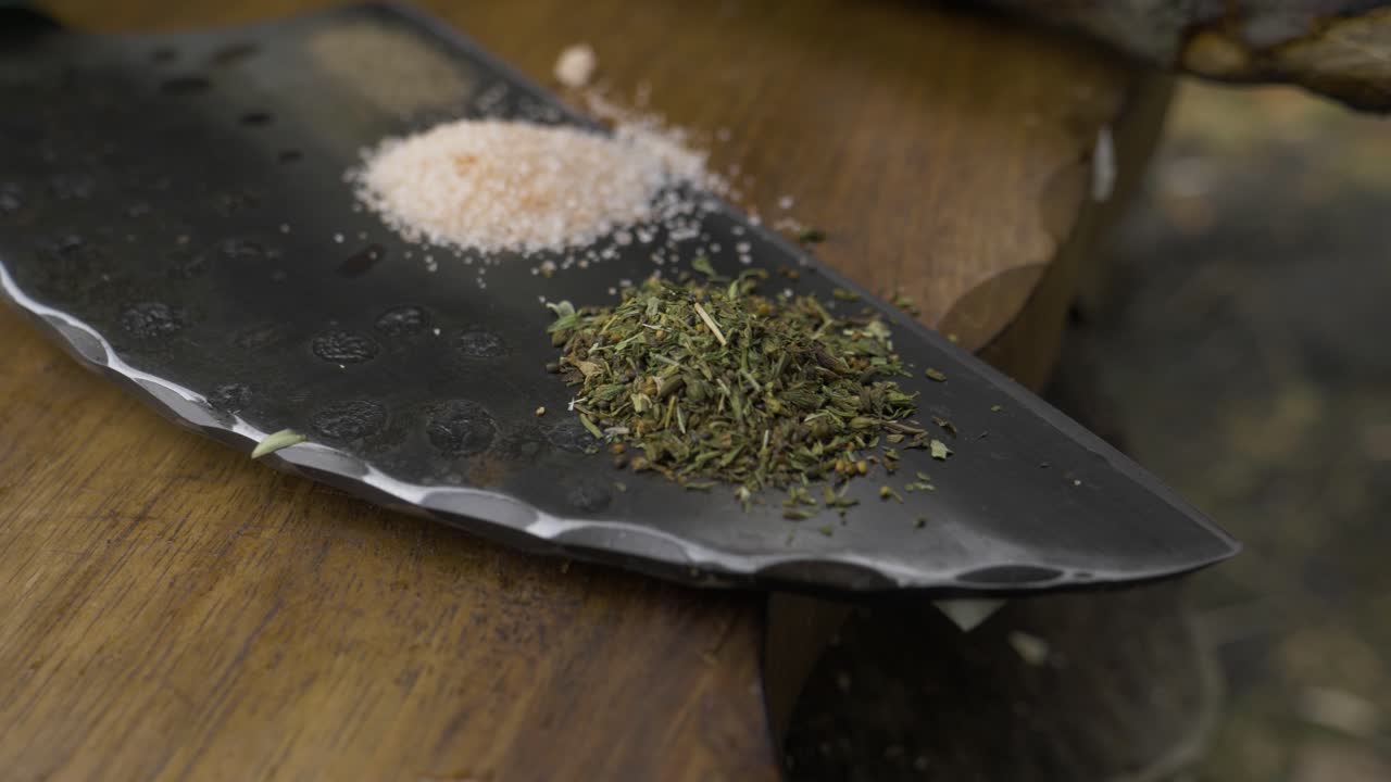 Almazan ready for cutting, sharp and covered with salt, pepper and thyme. It is very sharp and with an epic design.