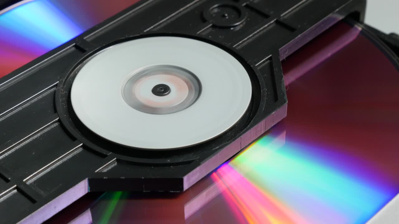 mecanismo de entrada del disco compacto y secuencia de lectura inicial 4k