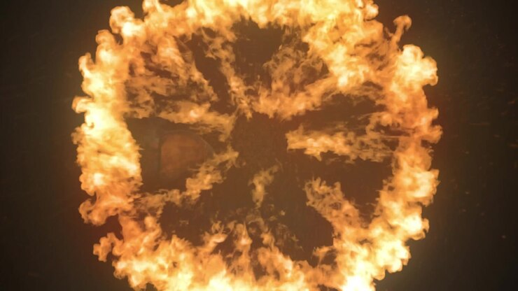 Animation of fire over a grey shadow on black background