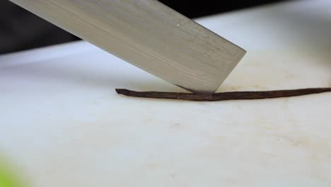 Cutting-Vanilla-Stick-In-The-Kitchen---close-up,-slow-motion