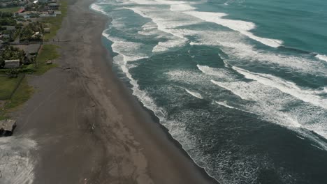 idyllic beach for surfing in el paredon, guatemala - aerial drone shot