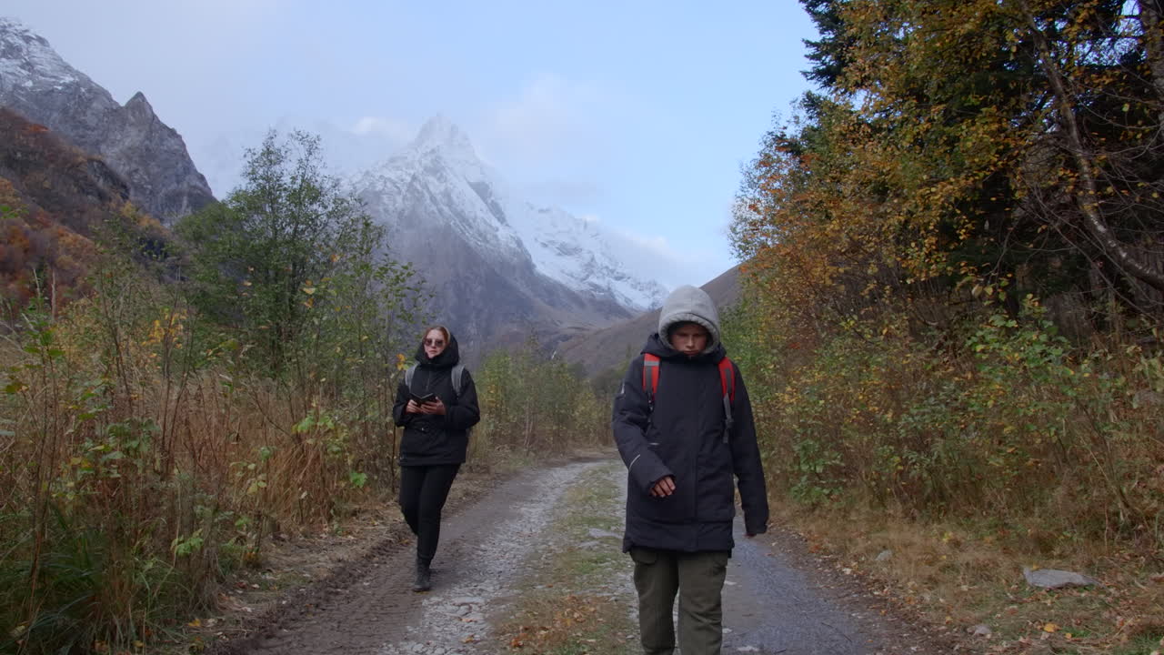 Hiking in Autumn Mountains with Family