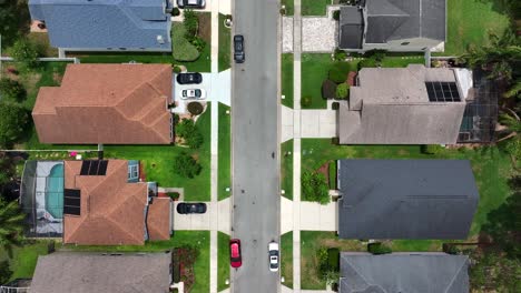 upper class neighborhood in florida with villas and mansions at sunny summer day