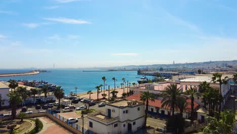 view of the port of algiers with the monument of the martyrs in the background